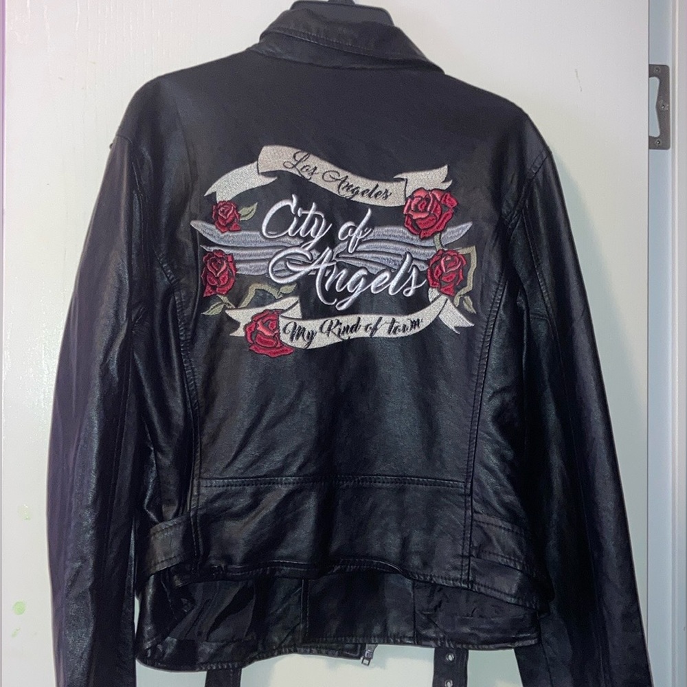 Black Jacket Size Large With embroidery on the back. Never worn before.